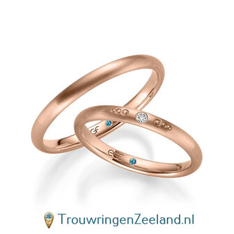 Trouwringen in 14/18 karaat ros&eacute;goud mat met in de damesring 1 diamant