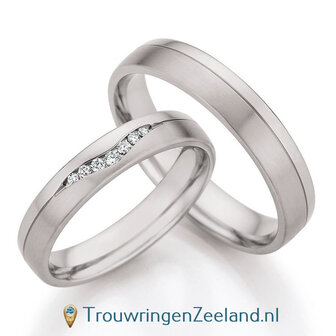 Trouwringen in palladium 500/950 met 7 diamanten in een V-vorm 