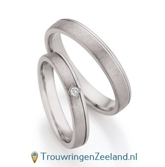 Trouwringen in palladium 500/950 glans en schuinmat met 1 diamant in een ruit gezet