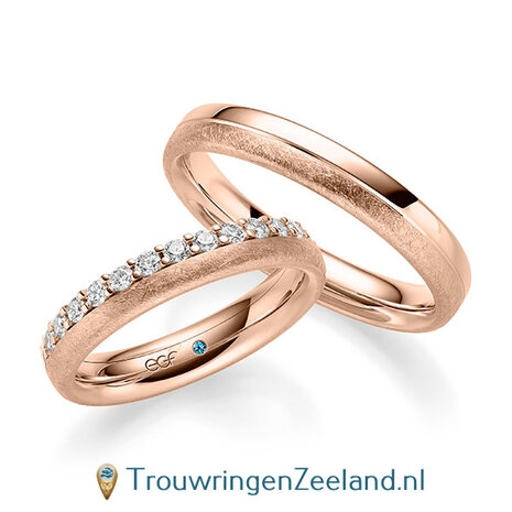 Trouwringen in 14/18 karaat witgoud icemat en glans met een kroonzetting van 14 diamanten - halve ring - in de damesring