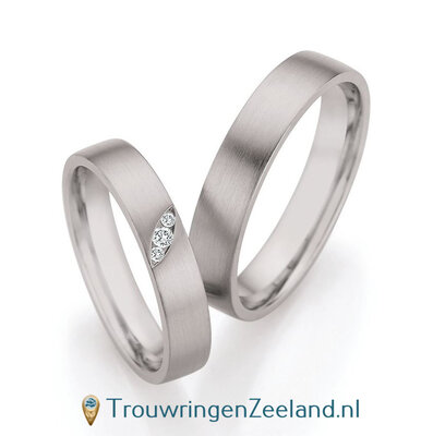 Trouwringen in palladium 500/950 met 3 diamanten ovaal en schuin geplaatst